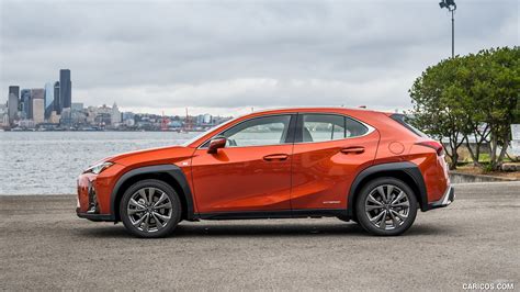 2019 Lexus UX 200h Hybrid F Sport (Color: Cadmium Orange) - Side | Caricos