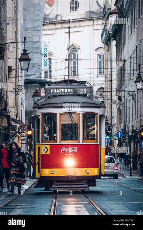 Old tram through the streets of beautiful Lisbon Stock Photo - Alamy