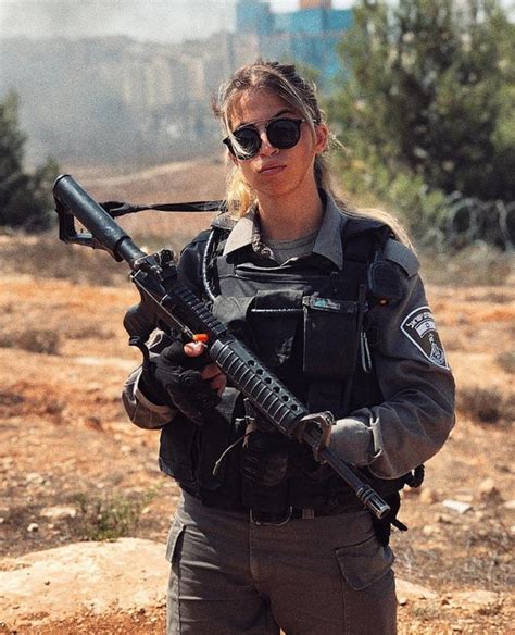 Beautiful and Deadly! A member of the Israel Defense Forces with an M4 ...