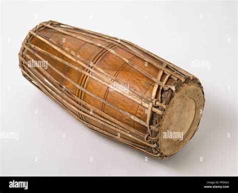 Mrdanga, double headed, barrel-shaped drum, angled view Stock Photo - Alamy