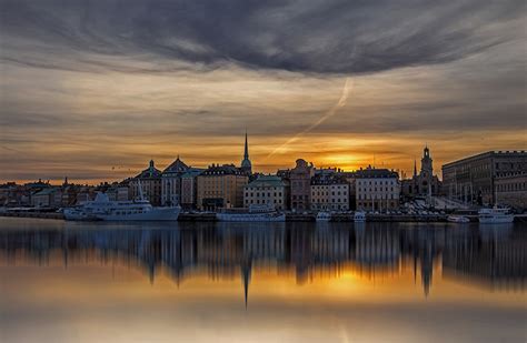 Desktop Wallpapers Stockholm Sweden ship Pier Rivers Evening Houses