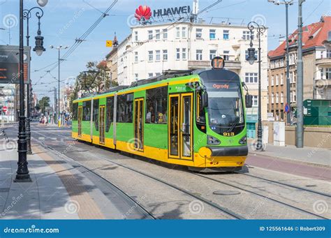 Green and Yellow Tram of Public Transport of Poznan. Editorial Photo - Image of public, august ...