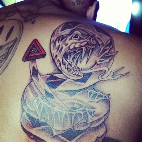 Chris Brown Tattoos & Meanings - A Complete Tat Guide