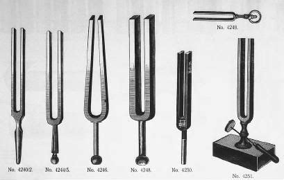 A PIANO TUNER, USING A TUNING FORK SUCH AS THE ONES SHOWN ABOVE ...