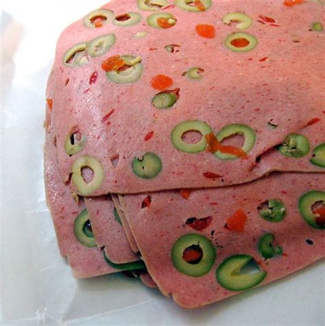 After being formed into a loaf and cooked, the loaf is kept whole so it can be sliced and served ...