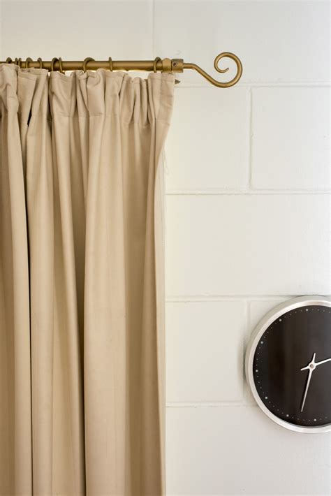 Free Image of home decor with beige curtain and clock | Freebie.Photography