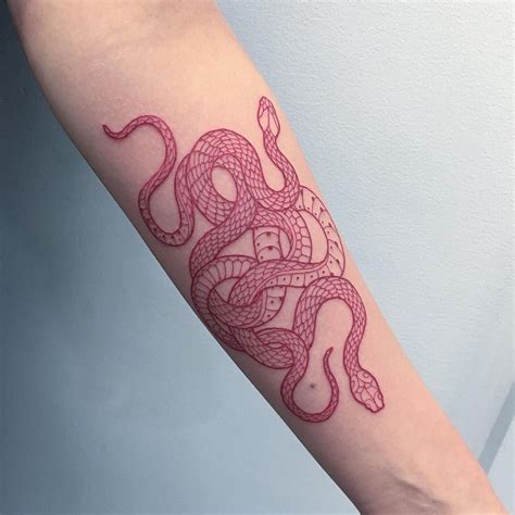 Red snake tattoo by mirkosata | Red ink tattoos, Red tattoos, Tattoo trends