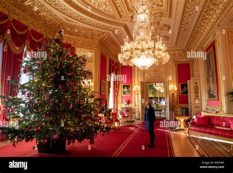 Final preparations are made to a 15ft Christmas tree in the Crimson ...