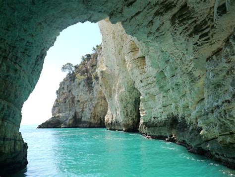 Sea Caves Along the Gargano Peninsula, Apulia, Italy. Stock Image ...