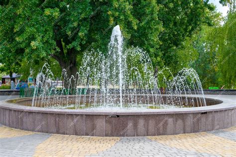 Premium Photo | Fountain in city park