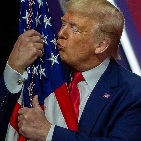 Watch Trump Fondle an American Flag at CPAC