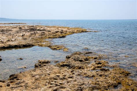 Pescoluse beach stock photo. Image of shore, blue, seaside - 251890928