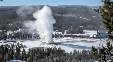 Geography Photos-Old Faithful Geyser in winter from Observation Point