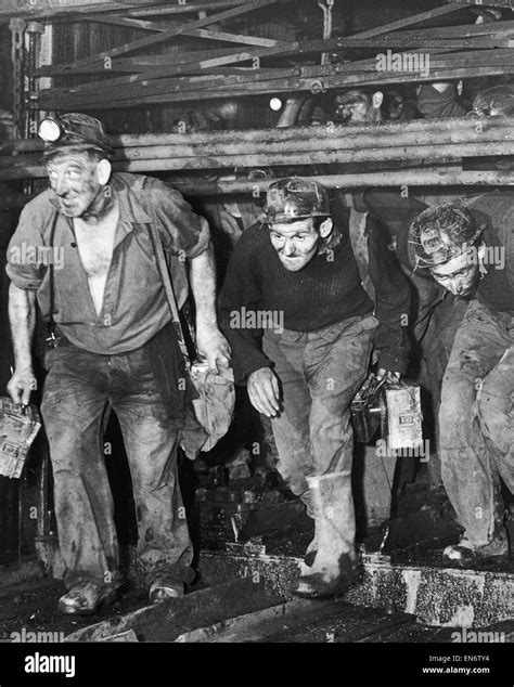 Three coal miners Black and White Stock Photos & Images - Alamy