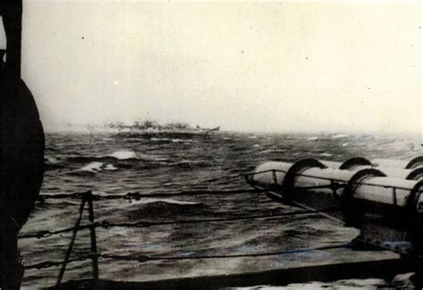 The sinking of the German Battleship Bismarck as seen from HMS Dorsetshire. This picture was ...