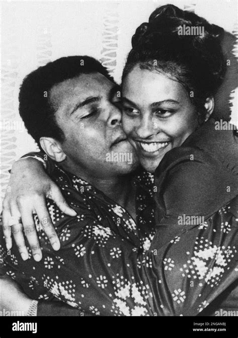 Heavyweight boxer Muhammad Ali hugs his second wife Belinda Ali in 1975. (AP Photo Stock Photo ...