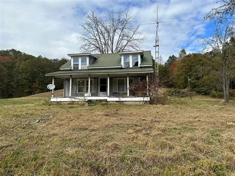 Wooded 81.3 acres & old farmhouse. $249,000 – Adorable Living Spaces