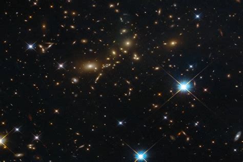 Colossal Distant Galaxy Cluster Captured By Hubble Space Telescope | MessageToEagle.com