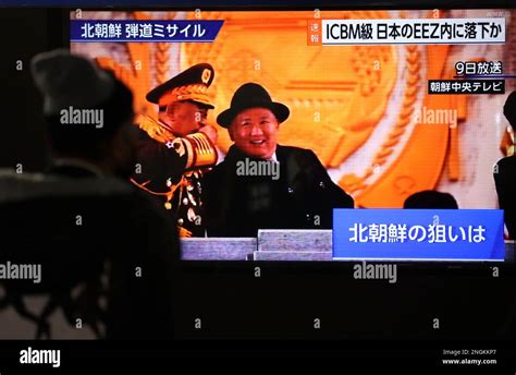 A screen monitor shows North Korean leader Kim Jong- un in Tokyo on Feb ...