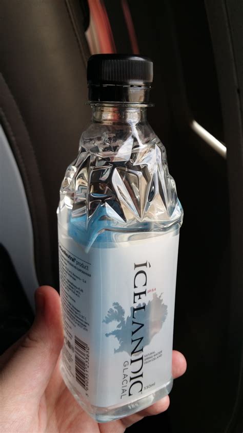 This water bottle on board Iceland Air is shaped like an iceberg. : r/mildlyinteresting