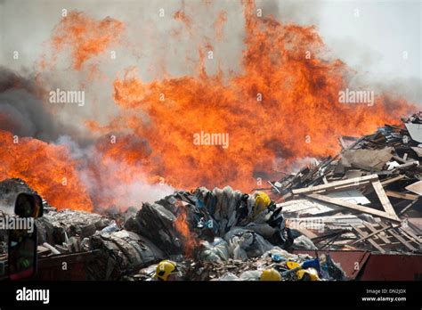 Flames fire rubbish fire waste big Stock Photo - Alamy