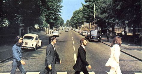 Abbey Road zebra crossing made famous by The Beatles is dug up to ...