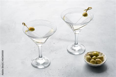 Martini with olives Stock Photo | Adobe Stock