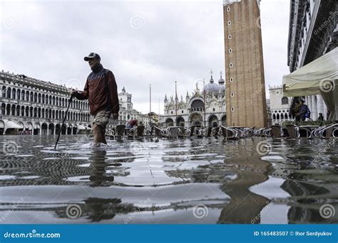 VENICE, ITALY - November 24, 2019: St. Marks Square Piazza San Marco during Flood Acqua Alta in ...