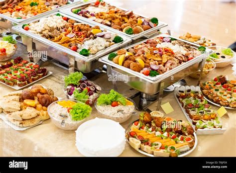 Catering buffet with food on table Stock Photo - Alamy