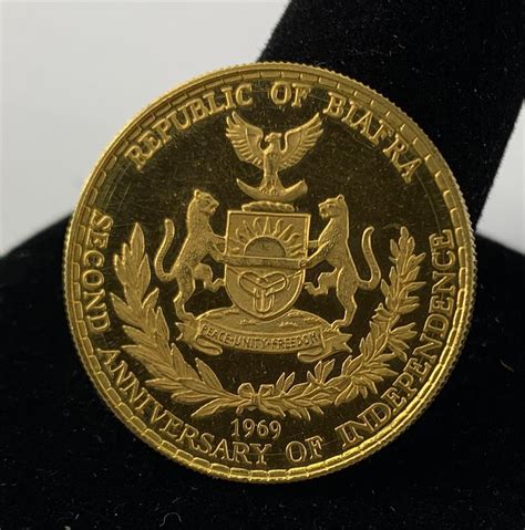 Lot - REPUBLIC OF BIAFRA FIVE POUND (VALUE) GOLD COIN