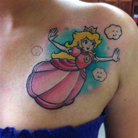 Gamerink on Instagram: “Princess Peach tattoo done by @brandoom. #tattoos #ink #videogametattoo ...