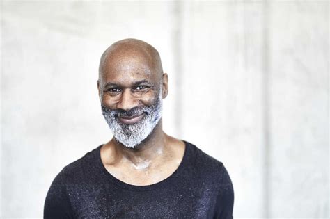 Portrait of sweating bald man with grey beard stock photo