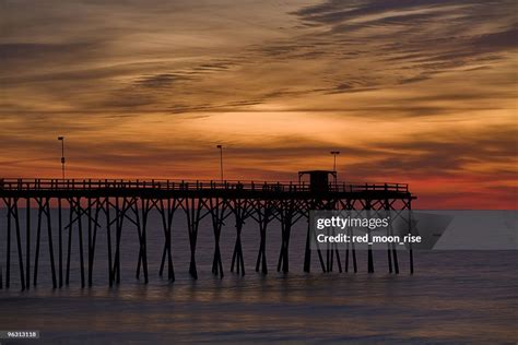 Pier Sunrise High-Res Stock Photo - Getty Images