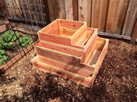 Made a tiered planter box from some redwood planks and thought you guys ...