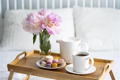 Tray with breakfast on bed. 16070894 Stock Photo at Vecteezy