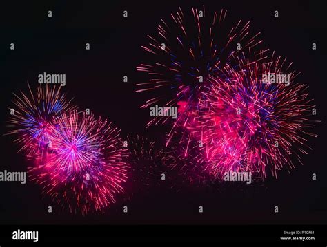 Colorful fireworks explosion on the black background Stock Photo - Alamy