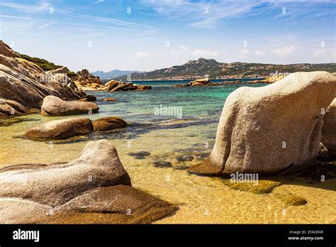 Weather Sculpted Rocks, Golfo di Arzachena, Clear Mediterranean and Distant Porto di Cannigione ...