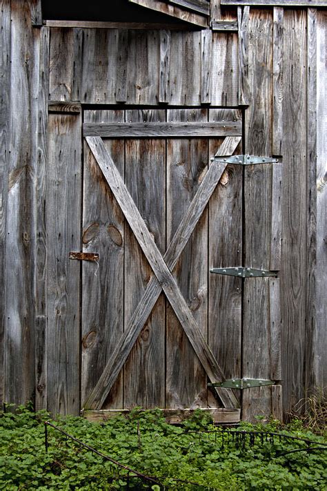 Rustic Old Wooden Barn Door Photograph by Heather Reeder