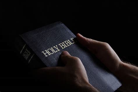 Best Bible Holding Human Hand Black Stock Photos, Pictures & Royalty ...