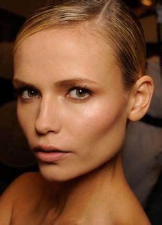 These cheekbones are almost alien-like because they pull the face so far wide and accentuate her ...