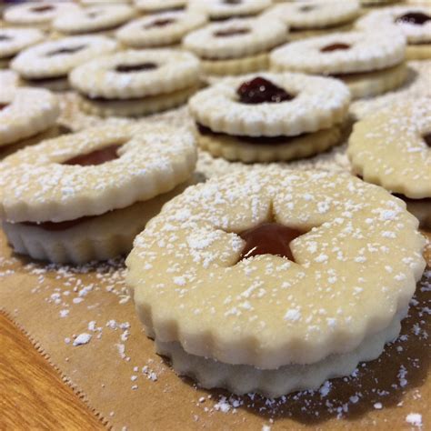 Delicious Linzer Torte Cookies with Nutella, Raspberry, and Strawberry