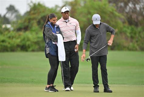 Tiger Woods' 16-year-old daughter Sam acted as his caddie for the first time. Here are 5 photos ...