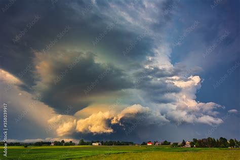 Supercell storm clouds with wall cloud and intense rain Stock Photo ...