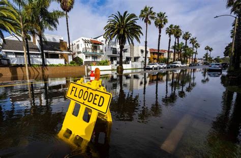 Big waves slam beaches and streets flood – but Southern California ...