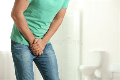 Man Suffering from Pain Indoors. Urology Problems Stock Image - Image ...