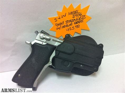 ARMSLIST - For Sale: Smith & Wesson Model 5906 9mm Stainless with Hogue Grips and Paddle Holster