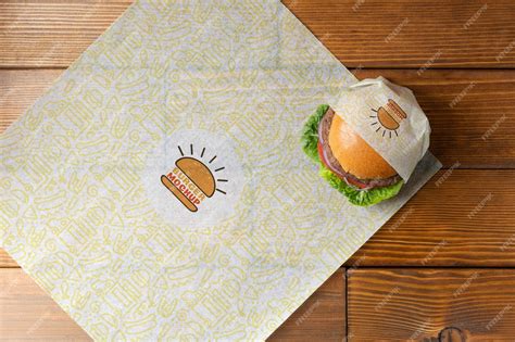 Premium PSD | Top view tasty wrapped burger