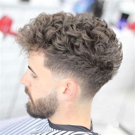 Low Taper Fade Curly Hair Styles For Men