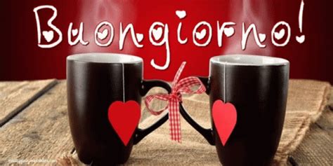 two black coffee mugs with hearts on them and the words buongigono