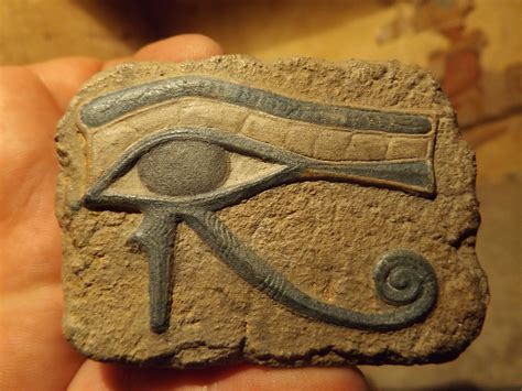 Egyptian Art - Eye of Horus and Ankh amulet. Ancient Egypt carving ...